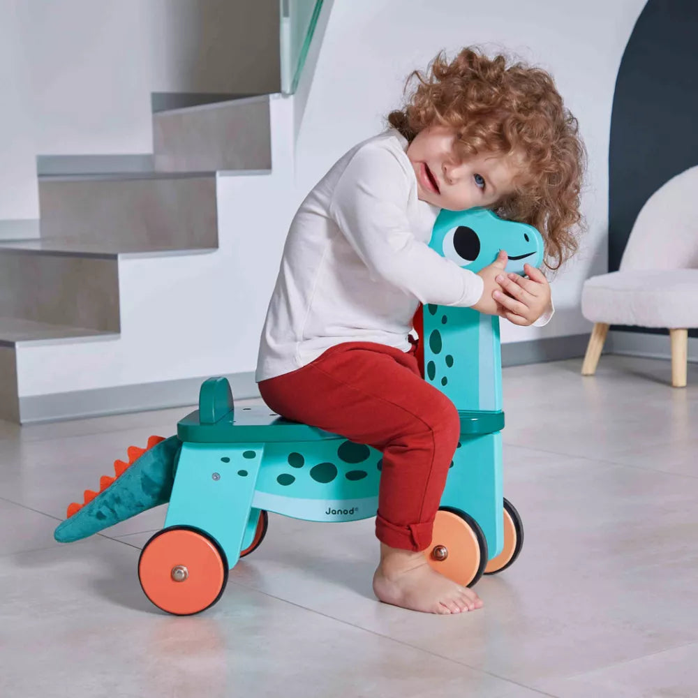 Janod Ride-On Wooden Dino Portosaurus Being Played With Picture