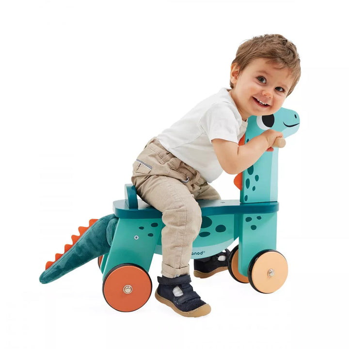 Janod Ride-On Wooden Dino Portosaurus Being Played With Picture