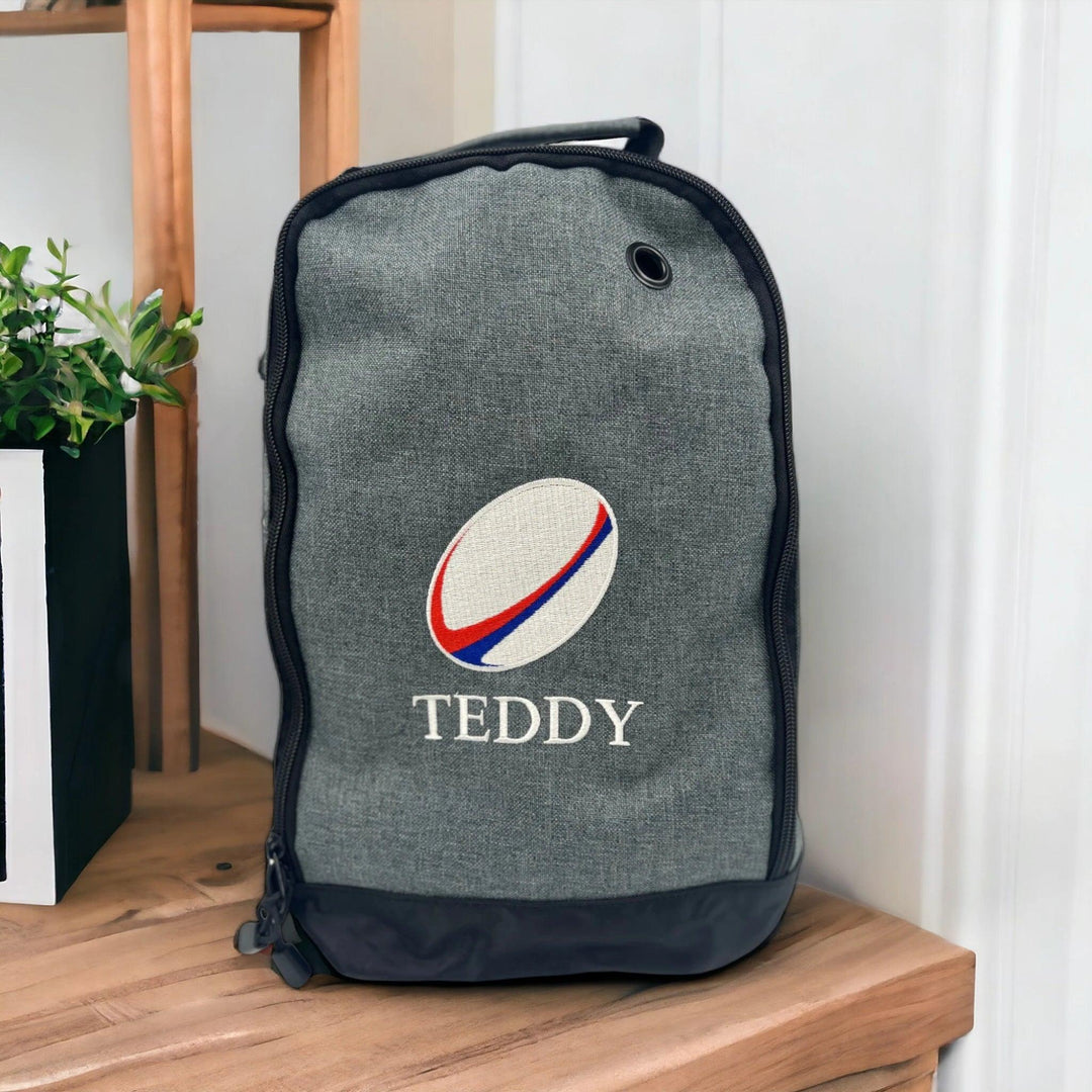 Personalised embroidered rugby boot bag in grey with the name Teddy in white 