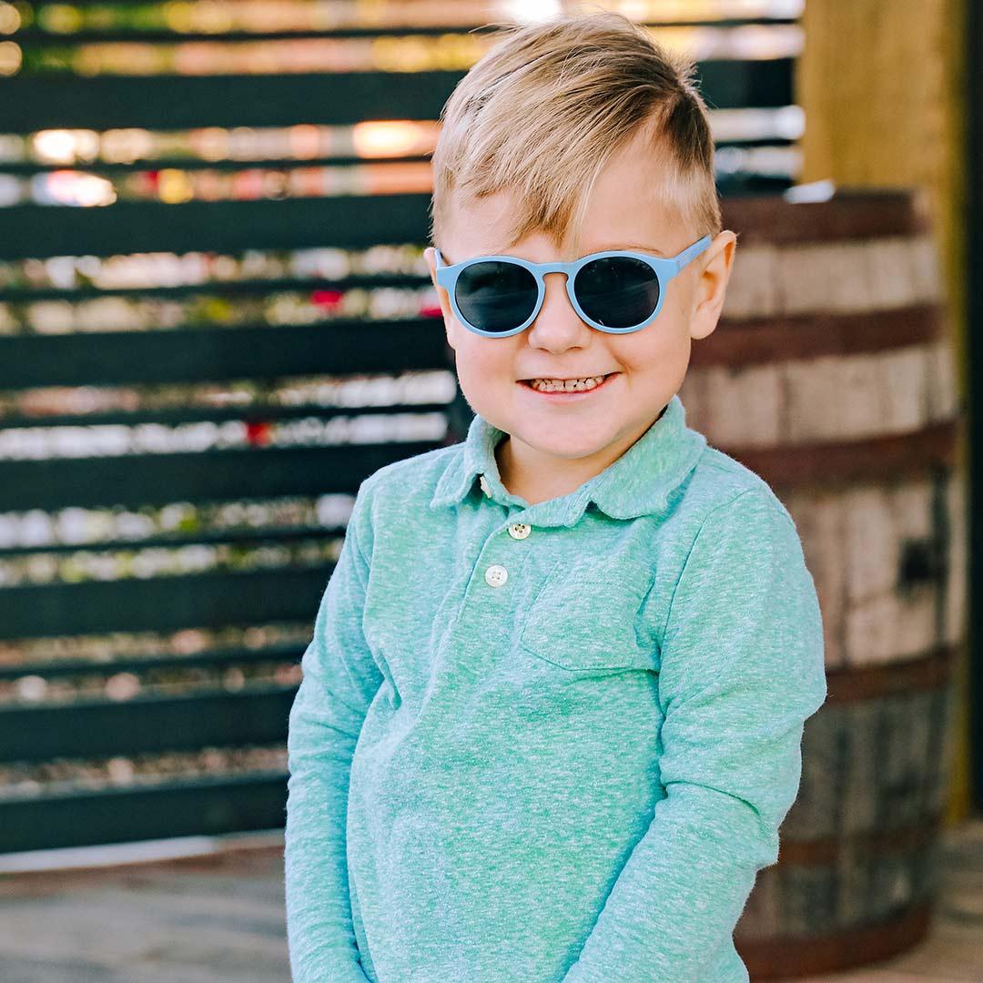 Babiators original keyhole sunglasses in up in the air blue being worn