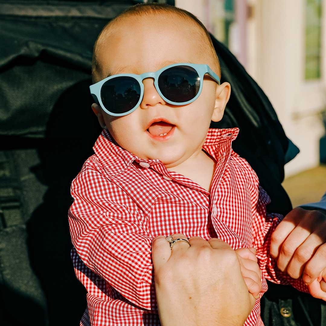 Babiators original keyhole sunglasses in up in the air blue being worn