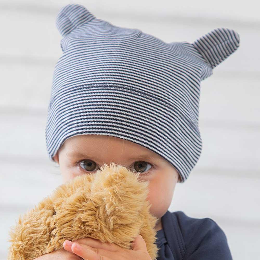 Little Tots Toys Organic Hat with Ears in Heather Colour being Worn