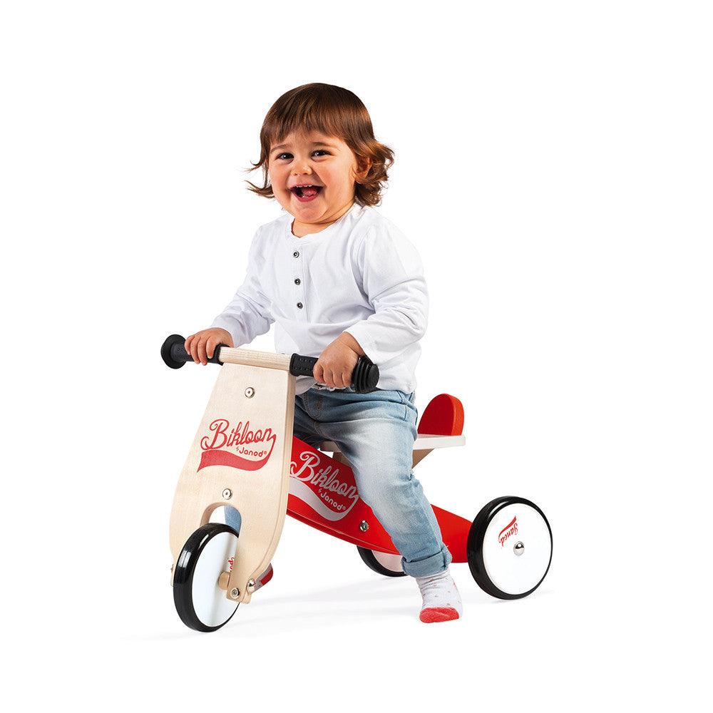 Janod Little Bikloon Red and White Ride-On being Ridden Picture