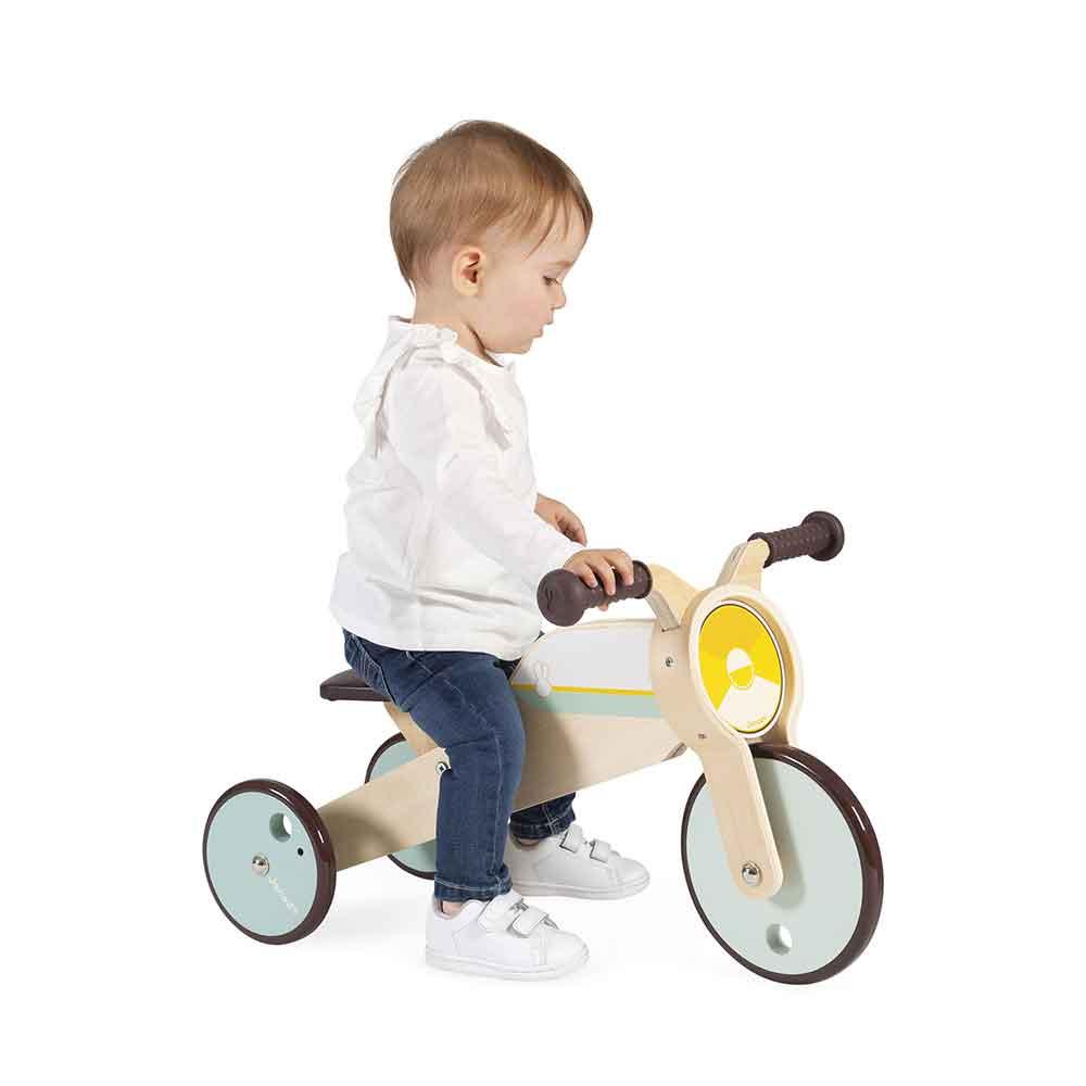 Janod FSC Wooden 2 in 1 Rocking Tricycle Trike being Ridden Picture