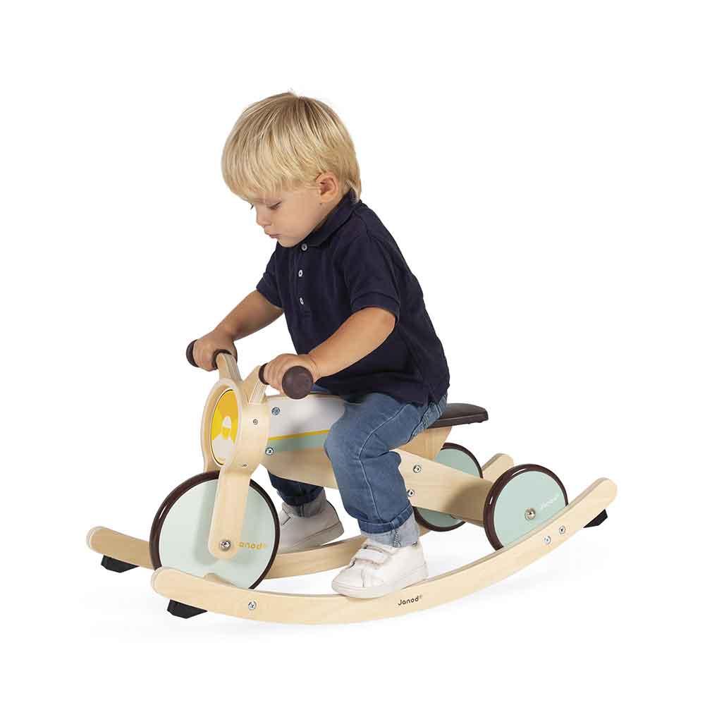 Janod FSC Wooden 2 in 1 Rocking Tricycle Being Ridden Picture