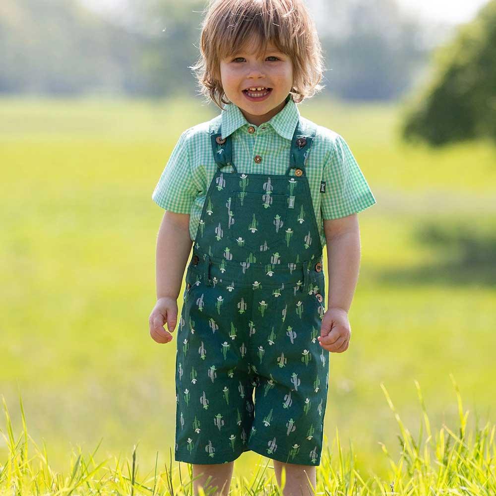 Kite Clothing GOTS Organic Cotton Cowboy Cactus Dungarees Being Worn Picture